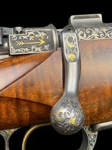 EXHIBITION GRADE - KARL HAUPTMANN
-
416 RIGBY
- STAINLESS - TAKEDOWN
- GOLD GAME SCENE - BONSI ENGRAVED - SWAROVSKI ILLUMINATED SCOPE - 5 of 19