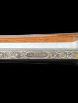 EXHIBITION GRADE - KARL HAUPTMANN
-
416 RIGBY
- STAINLESS - TAKEDOWN
- GOLD GAME SCENE - BONSI ENGRAVED - SWAROVSKI ILLUMINATED SCOPE - 14 of 19