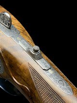 EXQUISITE -
HAUPTMANN
- DOUBLE RIFLE SIDELOCK DRILLING
-
OCTAGONAL BBLS
- EXHIBITION WOOD - 8x57 / 8x57 / 20ga-3