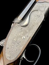 EXQUISITE -
HAUPTMANN
- DOUBLE RIFLE SIDELOCK DRILLING
-
OCTAGONAL BBLS
- EXHIBITION WOOD - 8x57 / 8x57 / 20ga-3