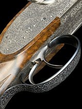 EXQUISITE -
HAUPTMANN
- DOUBLE RIFLE SIDELOCK DRILLING
-
OCTAGONAL BBLS
- EXHIBITION WOOD - 8x57 / 8x57 / 20ga-3