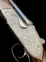 EXQUISITE -
HAUPTMANN
- DOUBLE RIFLE SIDELOCK DRILLING
-
OCTAGONAL BBLS
- EXHIBITION WOOD - 8x57 / 8x57 / 20ga-3