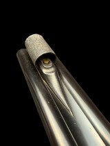 CLASSIC
-
HOLLAND & HOLLAND
- ROYAL HAMMERLESS EJECTOR
- 375 H&H BELTED - DOUBLE RIFLE - 1923 - 16 of 20