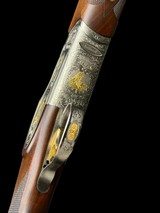BETTINSOLI
-
OVERLAND EL
- 12GA
-
GOLD GAME SCENE ENGRAVED - 30