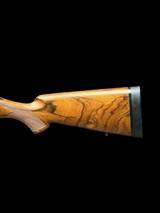KIMBER
-- 84M -
SELECT GRADE
- FANCY FRENCH WALNUT
- 243 WIN
-
30MM RINGS
-- THREADED BBL
- MINT - 3 of 14