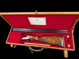 FLLI. RIZZINI | R2-E GAME GUN | SXS | 12GA | ENGRAVED | STUNNING WOOD - Image 1 of 19
