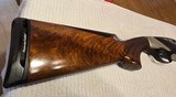 Benelli 828 O/U
Nickel 12 ga. - 5 of 15