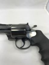 Colt Python 357 Magnum, 2 1/2" Royal Blue, new, salesman sample, unfired, unfluted cylinder, 99%+ cond. in the box,
comes with colt factory lett - 15 of 15