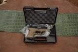 Pre-Owned - Taurus Millennium G2 PT111 Semi-Auto 9mm 3.25" FDE Handgun - 1 of 10