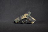 Pre-Owned - Glock G19 Camo Woodlander 9mm 4