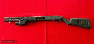 Remington 870 Riot Gun, 12 gauge, with mag pul adjustable stock and Surefire fore end with 600 lumen light