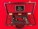 Pair of consecutive serial numbered Cold Gold Cup National Match 45 ACP in Huey Case
