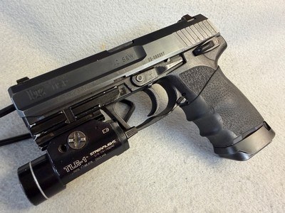 Heckler & Koch HK USP V1 .40 S&W Streamlight TLR-1 - Image 1 of 10