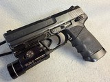 Heckler & Koch HK USP V1 .40 S&W Streamlight TLR-1