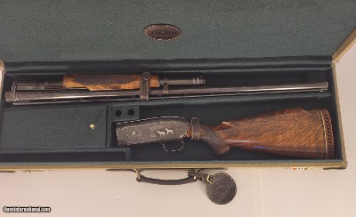 Winchester model 12 12 gauge
trap stock Engraved with silver inlay