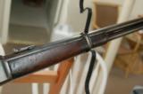 Winchester, Model 1886 SRC in 45-90 WCF, with a 22