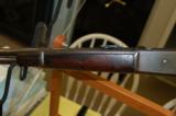 Winchester, Model 1886 SRC in 45-90 WCF, with a 22