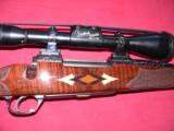 NEW Unfired Weatherby Model Mark V Custom
Cal. 257 Wby Mag bolt-action Rifle
- 15 of 20