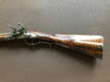 Custom .62 cal flintlock left- handed muzzleloader rifle, made by Mike Gahagan - 1 of 4