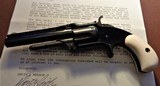 Cased set of S&W Model # 1 1/2
Revolvers .32RF, blue and nickel, with factory letters, ivory grips and so much more! - 9 of 11