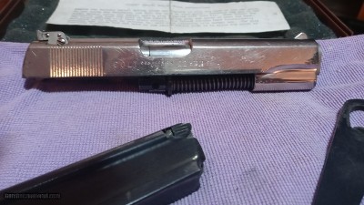 Colt 22 Conversion Kit Nickle plated original,
w/Clark recoil spring and stabilizer rod.