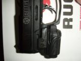 Ruger SR22 (SR22P-CTL)
semi-auto pistol .22 lr with Crimson Trace Light NEW in BOX - 5 of 6