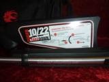 Stainless Takedown with flash hinder, BX25 magazine, fiber optic stights, and carry case. 10/22 Ruger 11125 - 2 of 5