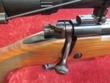 Winchester Model 70 Super Grade bolt action rifle .300 win mag with Bushnell Elite 3200 scope - 19 of 24