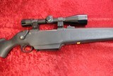 Mossberg 695 bolt action 12 gauge Slug gun w/Weaver Scope - 8 of 11