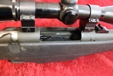 Mossberg 695 bolt action 12 gauge Slug gun w/Weaver Scope - 11 of 11