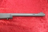 Mossberg 695 bolt action 12 gauge Slug gun w/Weaver Scope - 9 of 11