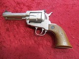 Ruger New Model Blackhawk 6-shot .357 mag/.38 spl Stainless/Wood grips 4 5/8" bbl - 1 of 11