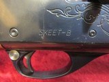 Remington 1100 Skeet B 12 ga. 25 1/2" VR bbl (IC Fixed choke) XX Fancy Walnut Stock - 14 of 19