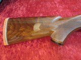 Remington 1100 Skeet B 12 ga. 25 1/2" VR bbl (IC Fixed choke) XX Fancy Walnut Stock - 11 of 19