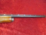Remington 1100 Skeet B 12 ga. 25 1/2" VR bbl (IC Fixed choke) XX Fancy Walnut Stock - 18 of 19