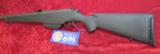 Mossberg 695 bolt action 12 ga slug gun 22" ported rifled barrel Black Syn. Detachable Mag - 3 of 10