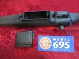 Mossberg 695 bolt action 12 ga slug gun 22" ported rifled barrel Black Syn. Detachable Mag - 2 of 10