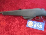 Mossberg 695 bolt action 12 ga slug gun 22" ported rifled barrel Black Syn. Detachable Mag - 1 of 10