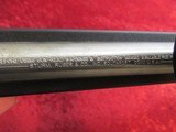 Ruger 10/22 Carbine semi-auto .22 lr 18.5" bbl SS & Blk Syn w/ Leupold base & Banner 3x9 scope - 13 of 13