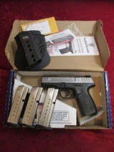 Smith & Wesson S&W SD9VE 9mm semi-auto pistol 4" bbl FS 16-shot Silver SS Slide/Black LNIB #223900 - 1 of 7