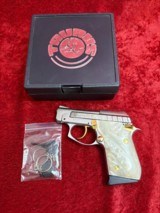 Taurus PT-22 Nickel w/gold accent & Mother of Pearl Grips LNIB