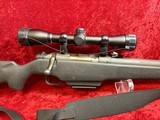 Mossberg 695 bolt action 12 ga slug gun 22