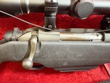 Mossberg 695 bolt action 12 ga slug gun 22