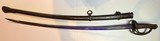 Civil War period Model 1860 Light Cavalry Saber with crowned “GG” Solingen import mark and original scabbard - Image 1 of 13