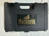 AMERICAN WESTERN ARMS 45 COLT PEACEKEEPER 5 1/2 