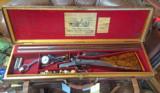 James Purdey Shot and Ball 8 gauge!
Excellent condition in makers case......... - 1 of 12