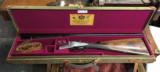 Holland & Holland Dominion radiused action sidelock ejector in very nice nick!
Cased! - 1 of 9