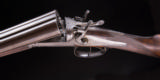 Holland & Holland
Top Lever hammer gun with beautiful Damascus barrels - 3 of 8