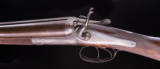 Holland & Holland
Top Lever hammer gun with beautiful Damascus barrels - 7 of 8