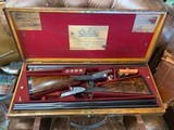 Boss & Co Best Quality Matched Pair with side lever opening ~ Super rare and beautiful!
This listing shows pictures and data of gun number "1&qu - 1 of 11